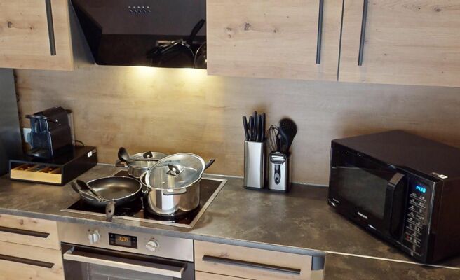 CROWN LIVING Design Loft, KÃ¼che, Bibliothek, Gartensitzplatz