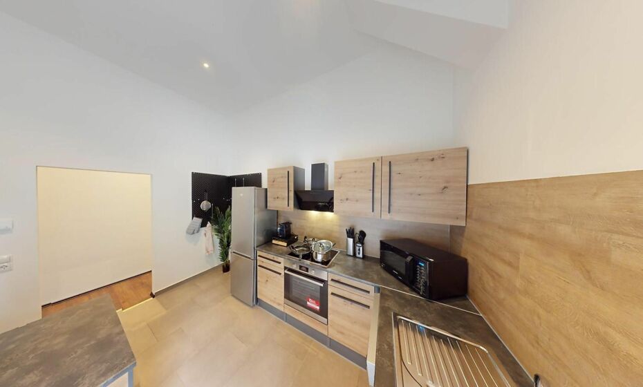 CROWN LIVING Design Loft, KÃ¼che, Bibliothek, Gartensitzplatz